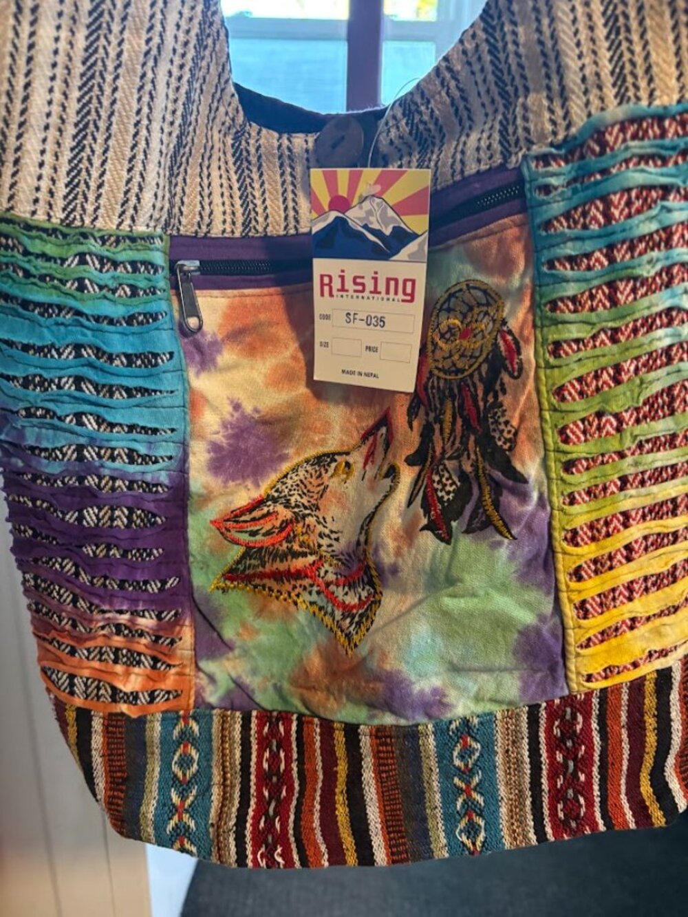 Rising International Crossbody bag